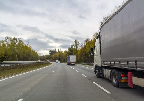 truck-on-freeway-road-cargo-transportation-concep-2024-12-06-03-01-20-utc-min
